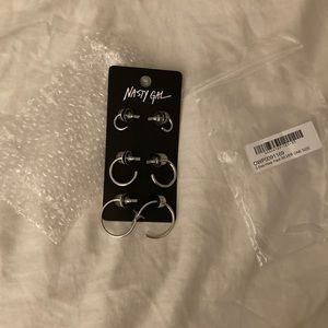 Three silver earrings hoop